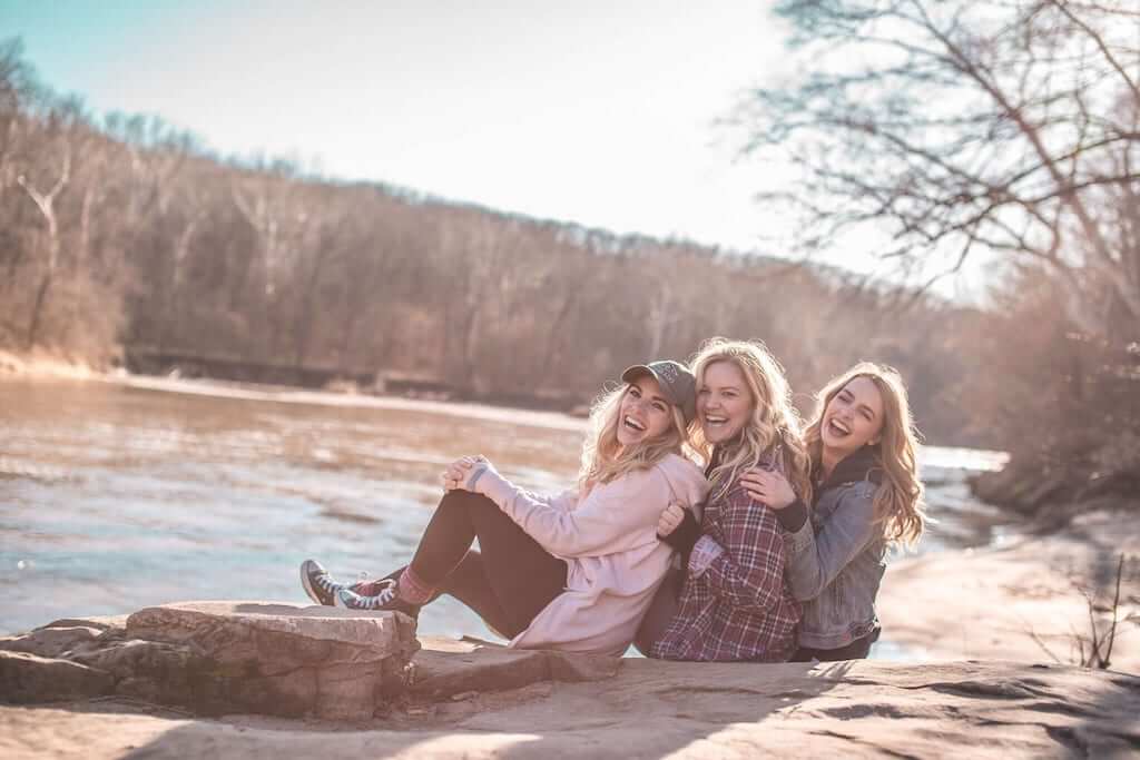 Three Swedish girls laughing