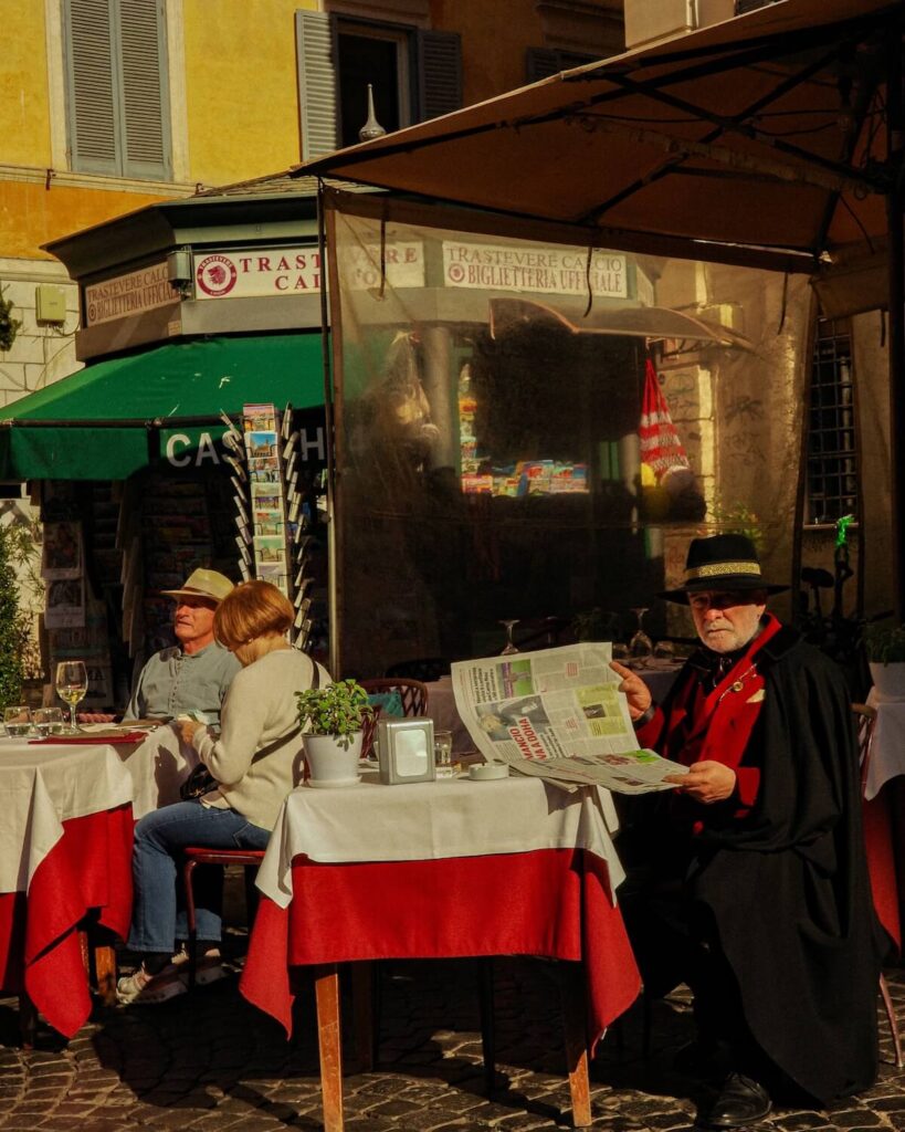Idyllic outdoor café setting in Lazio, Italy with locals enjoying the day