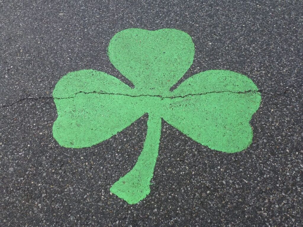 clover leaf painted on asphalt