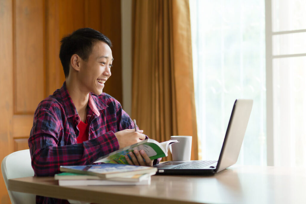Boy studying online