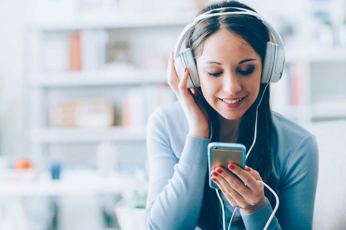 Girl listening to podcast