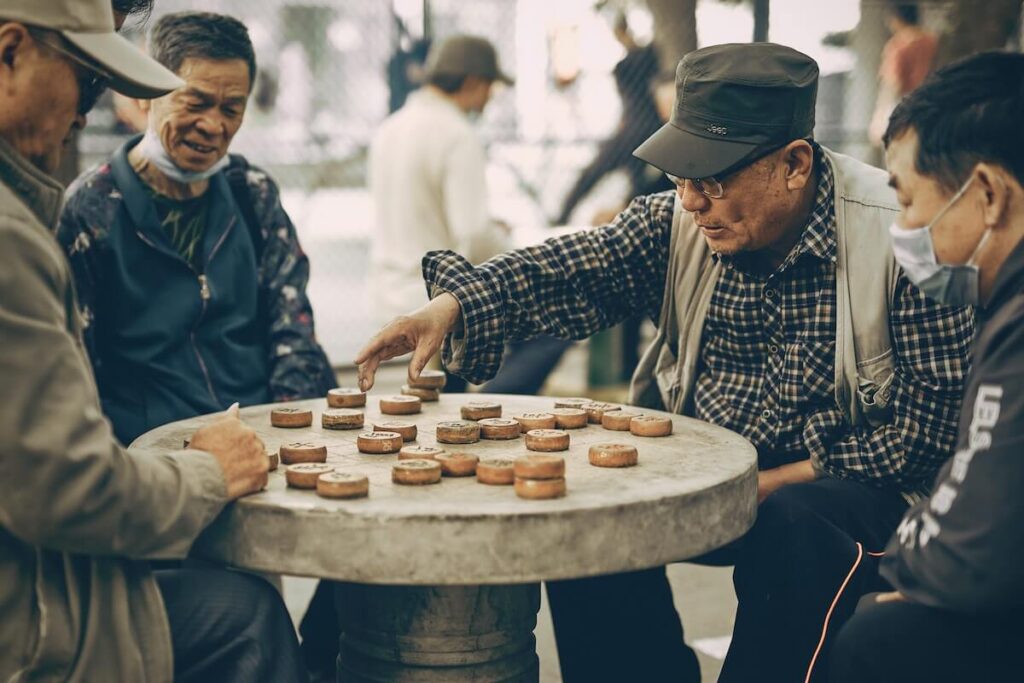 Chinese man playing chess
