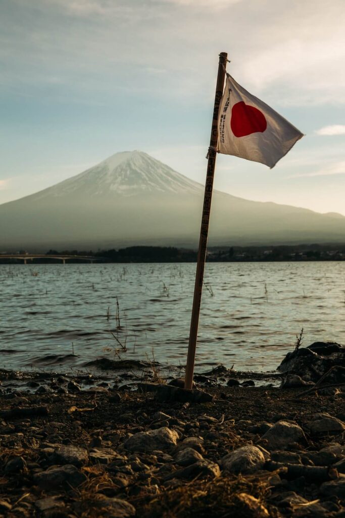Japanese flag with Mt Fuji in background