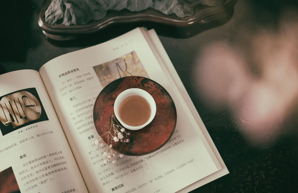 Chinese book and cup of tea
