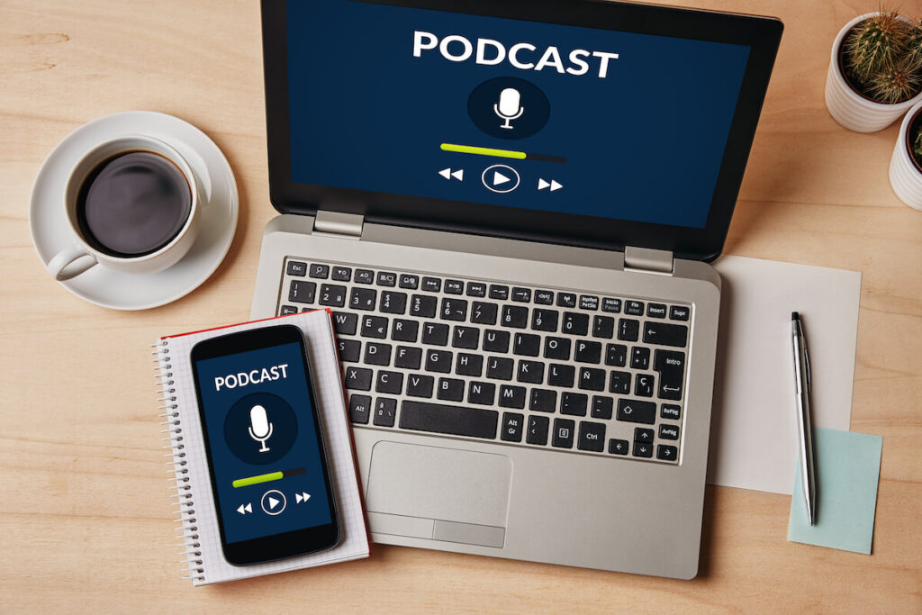 Podcast concept on laptop and smartphone screen