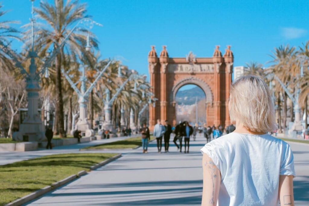 Woman with Barcelona landmark in background