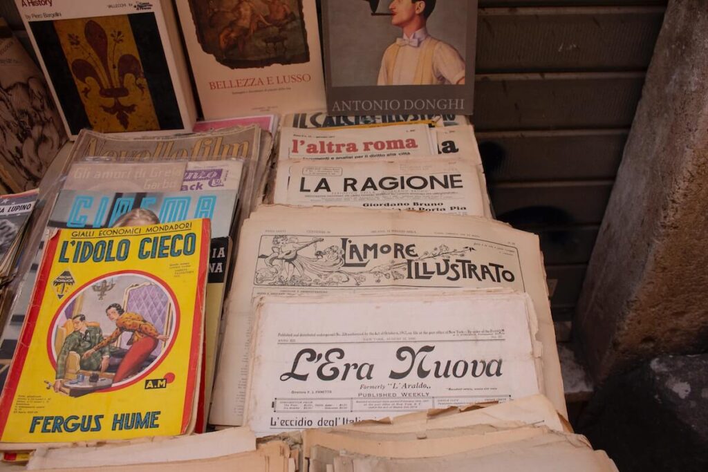 pile of Italian books and newspapers