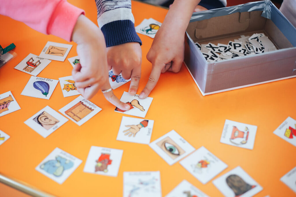 children playing cards during a school activity