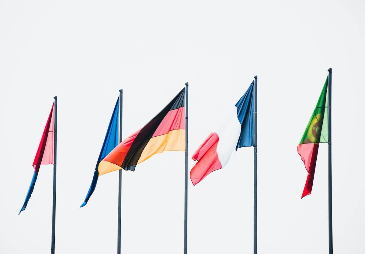waving flags of several European countries