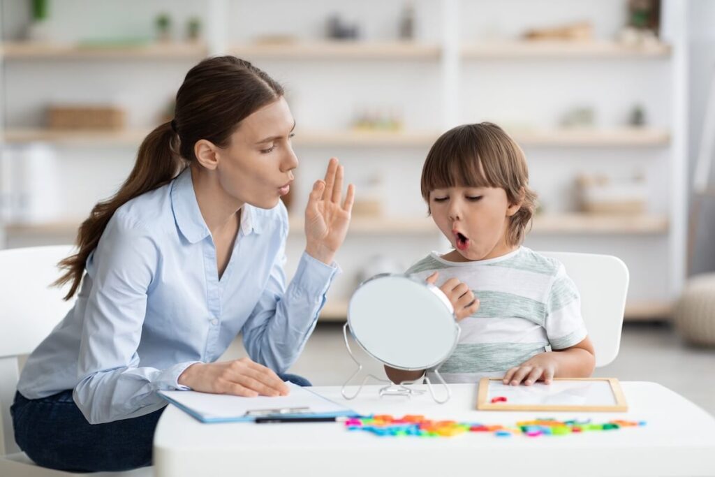female teacher patiently teaching a student