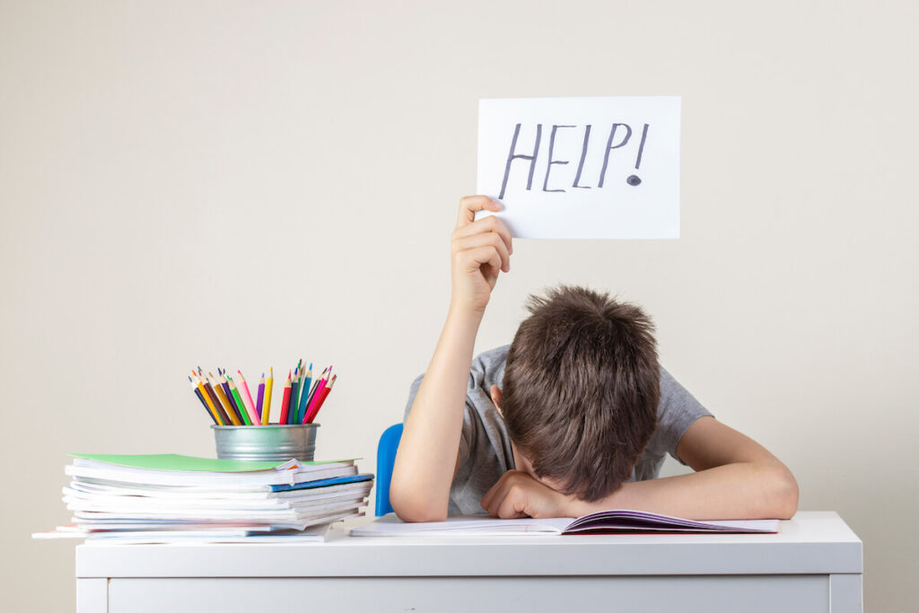 young student frustrated and asking for help