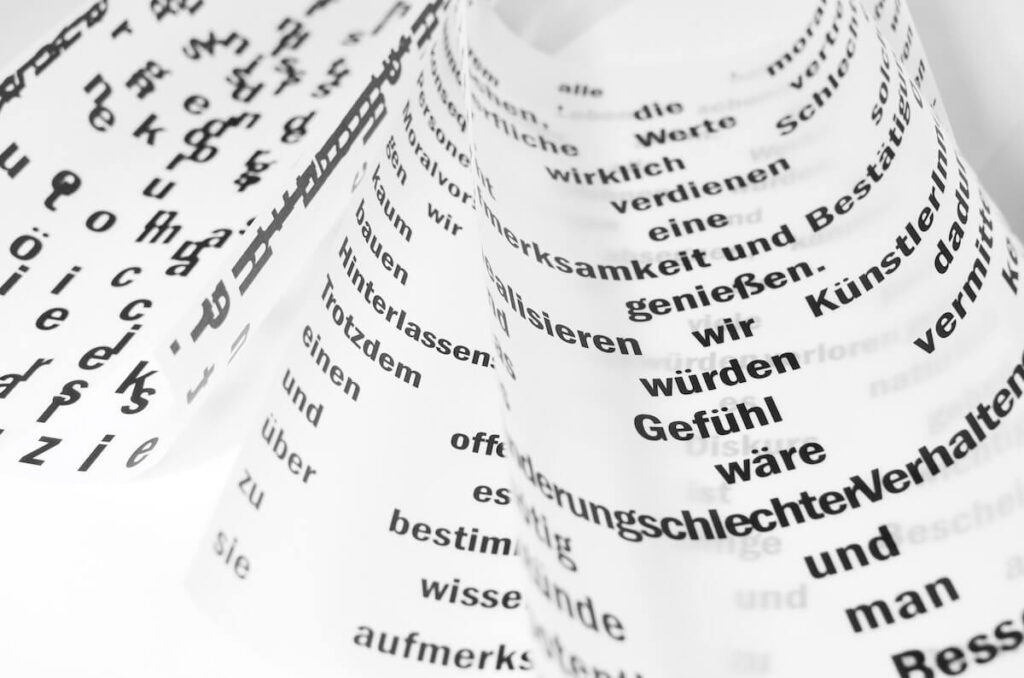 German text on pieces of paper