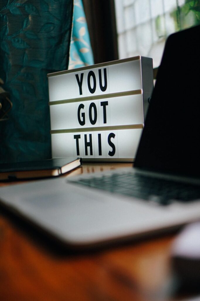 “You got this” sign beside laptop on a table