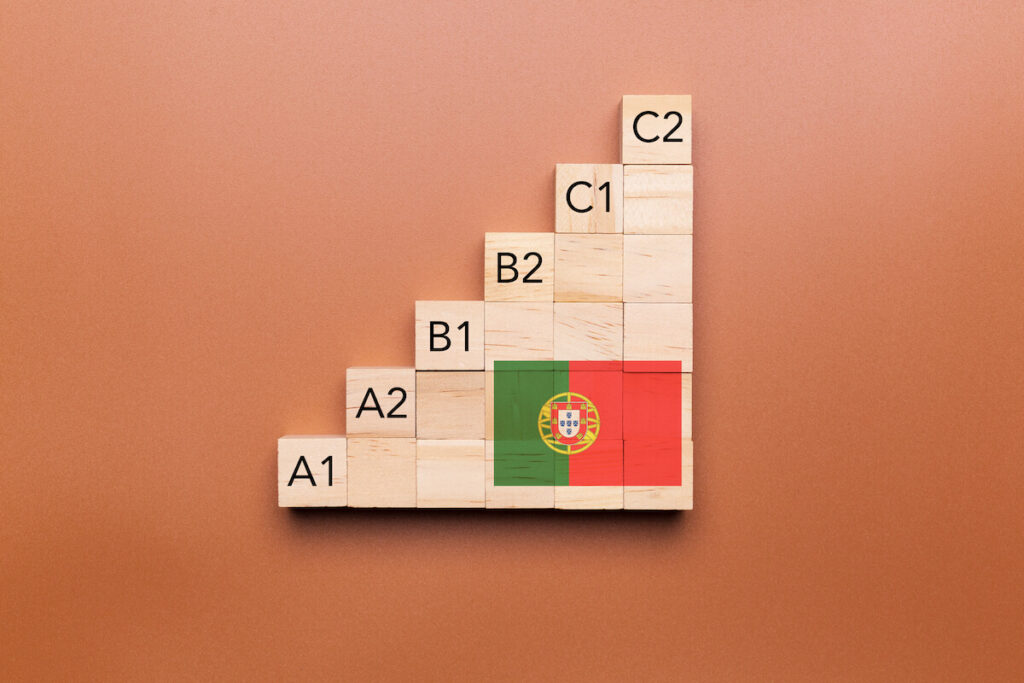 cefr wooden cubes with flag of portugal painted on top