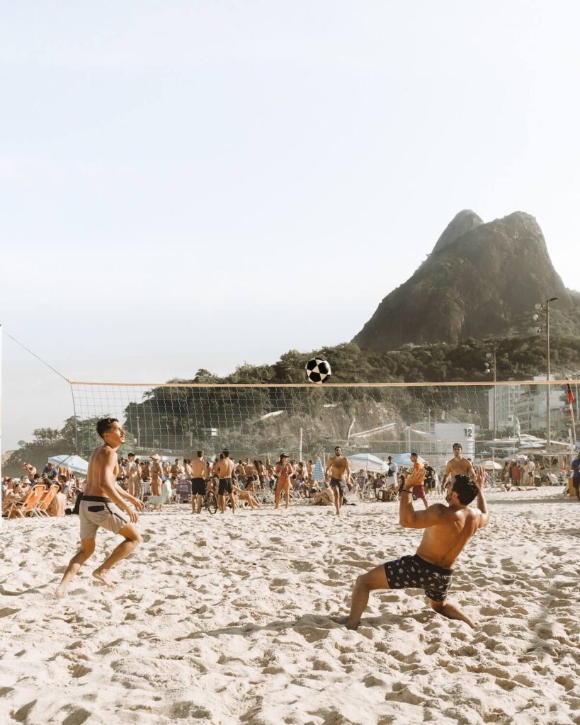 men playing footvolley in ipanema