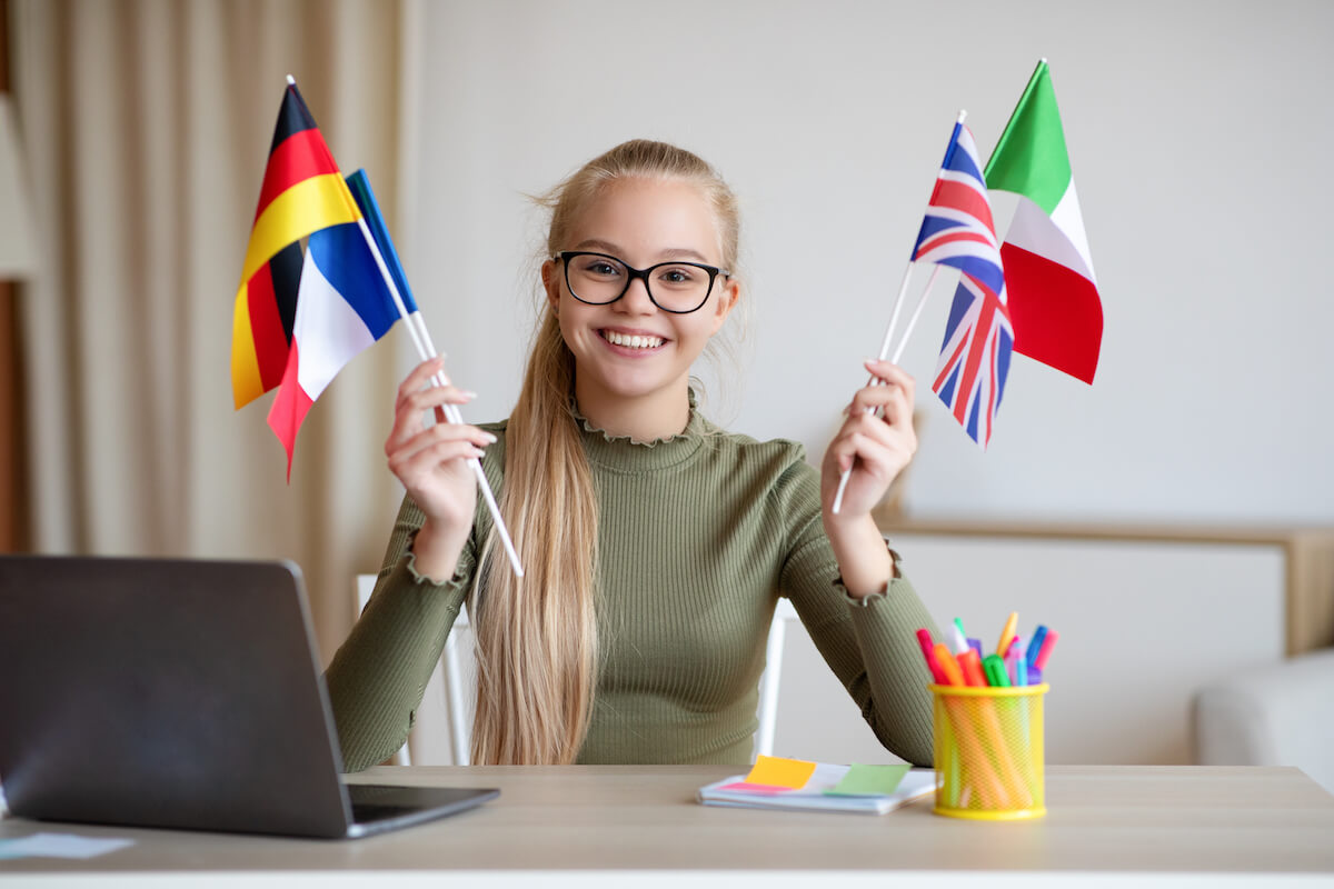 Girl holding many flags