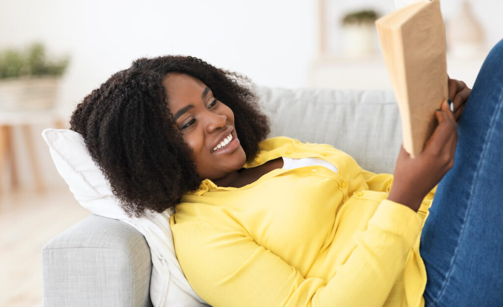 Girl reading portuguese novel