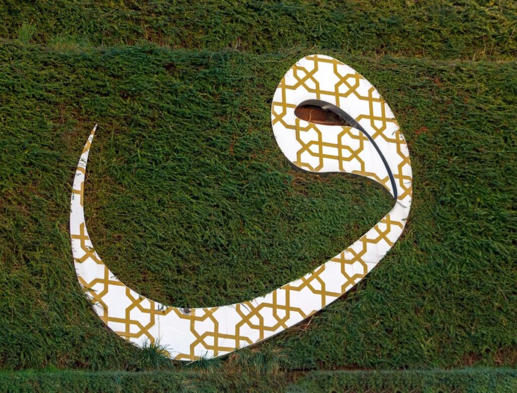Arabic letter Waw, the sixth letter of the Semitic abjads, as seen in Camlica Mosque's garden in Istanbul Turkey