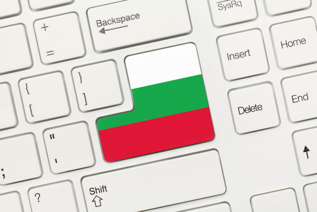 Close-up view of Bulgarian flag on white conceptual keyboard 