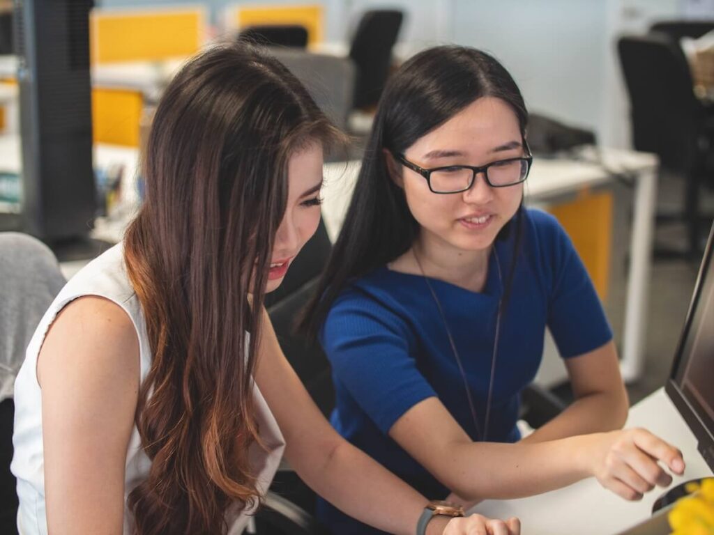 two women taking a class together