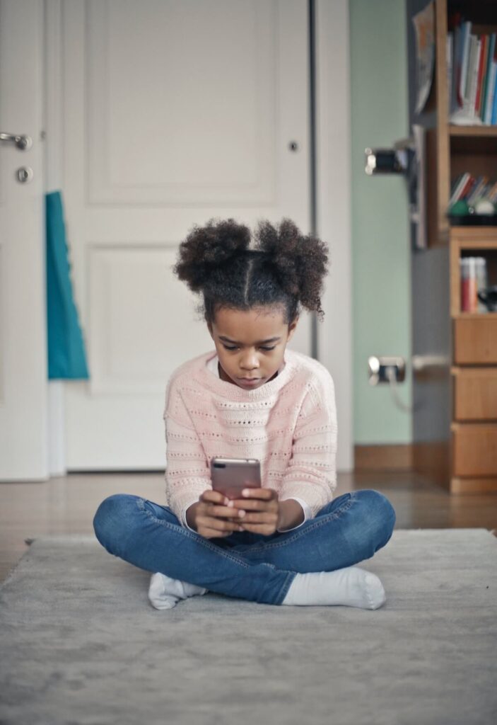 girl focusing on phone