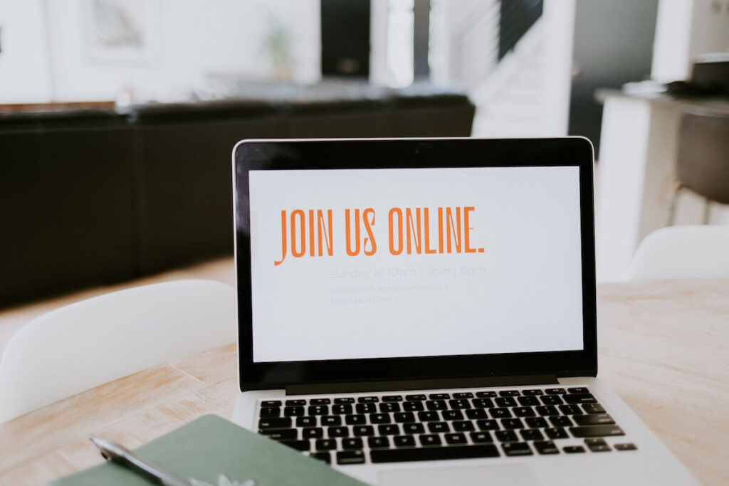 join us online written on computer screen