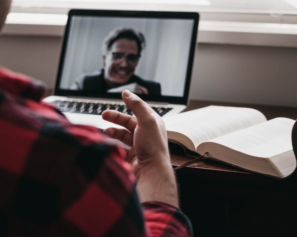 two men on video call