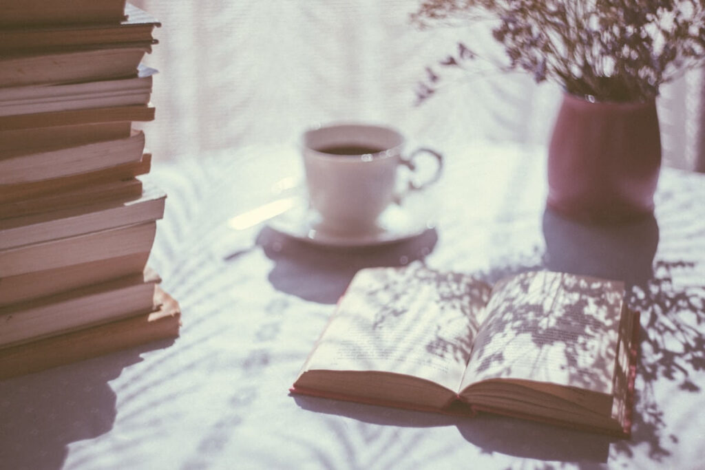 open book on sun drenched desk