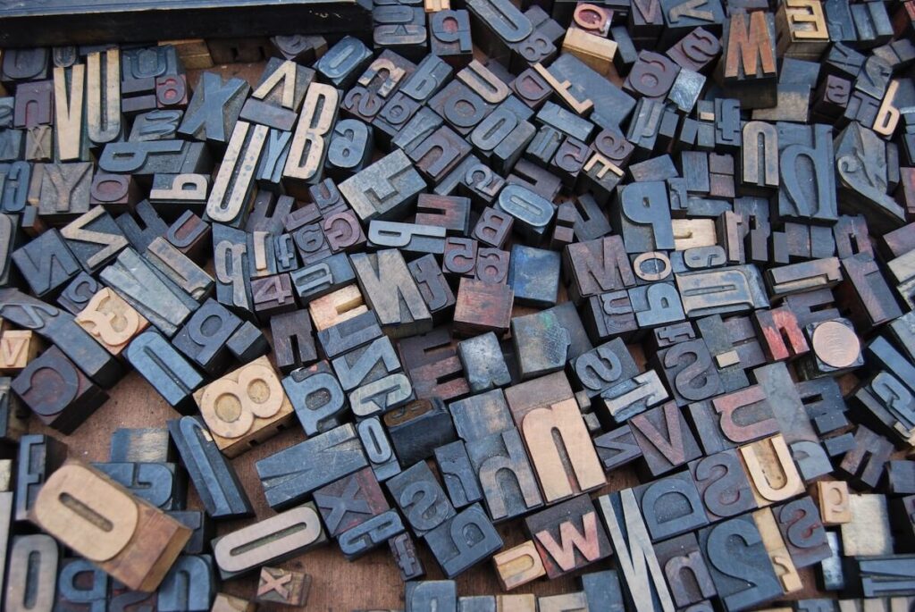 bunch of wooden letter blocks