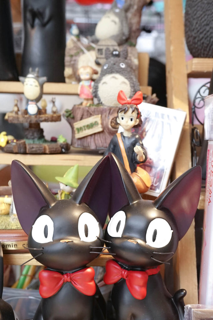 Studio Ghibli characters on display in a store