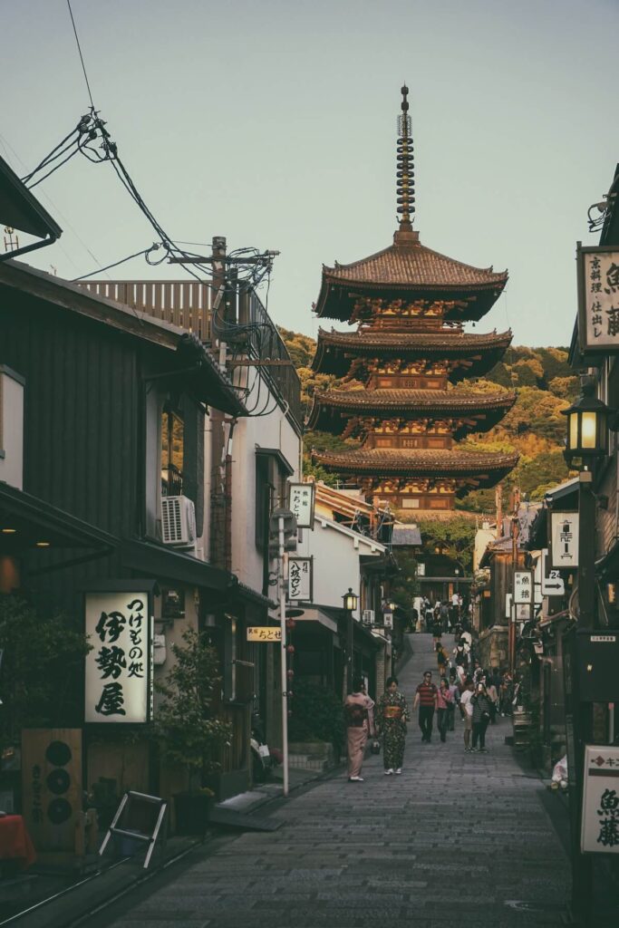 tourists walking around a street in Kyoto, Japan