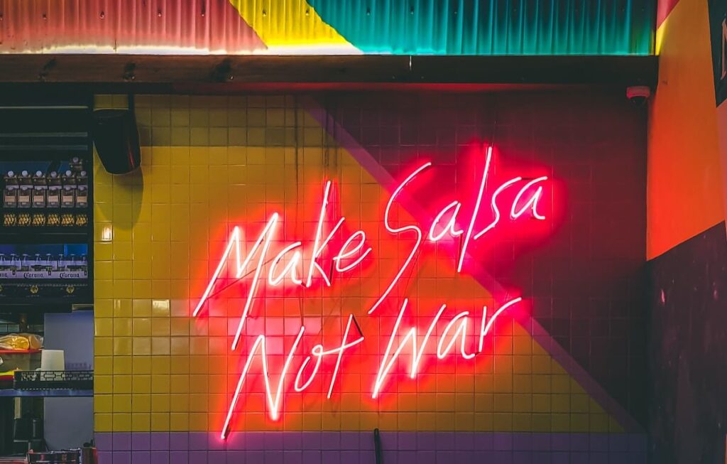 make salsa not war neon sign