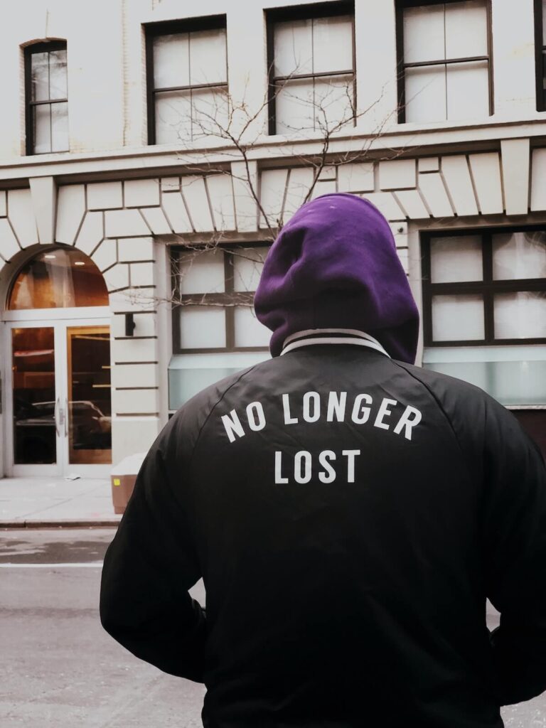 person wearing no longer lost hoodie outdoors