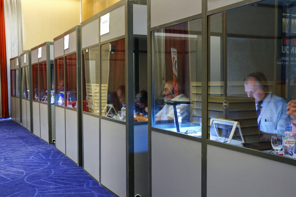 Booths for simultaneous interpreters at the international conference
