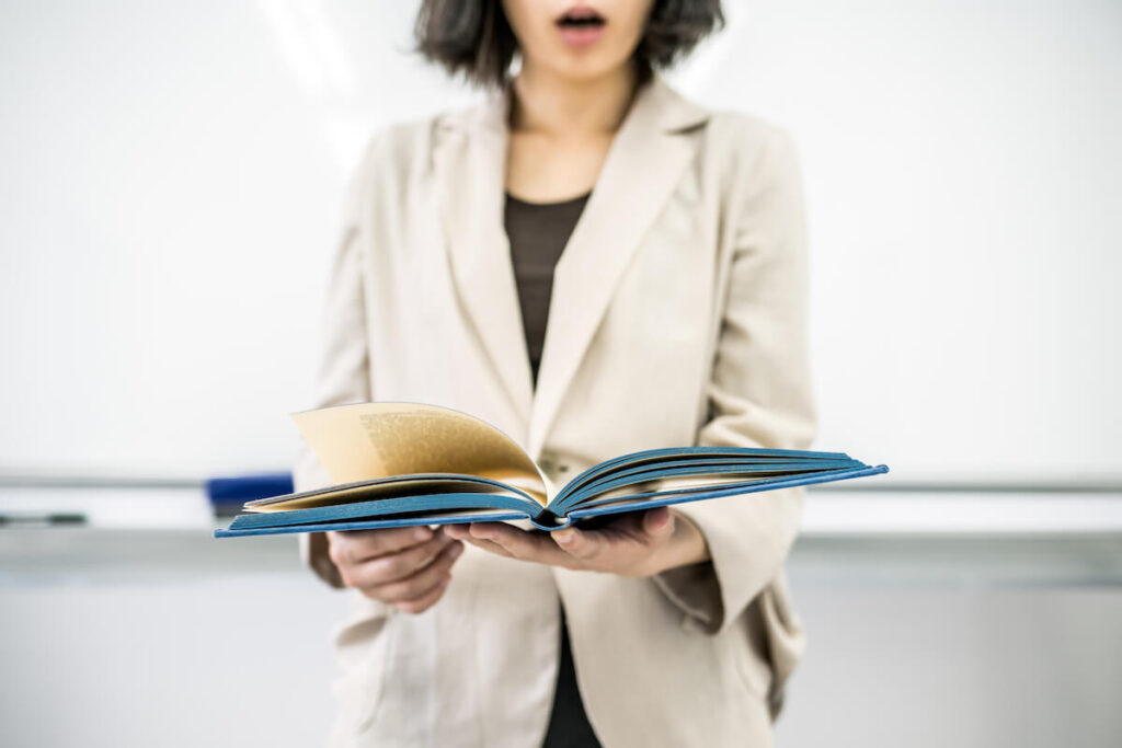 woman reading aloud