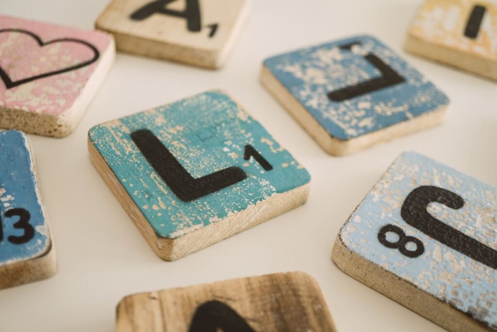 old wooden letter blocks on table