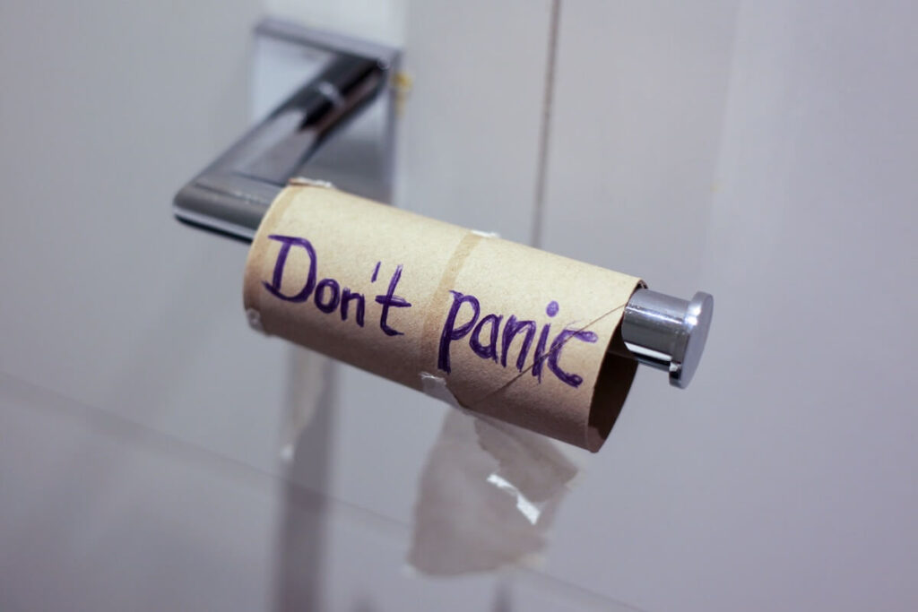 don't panic written on finished toilet paper roll