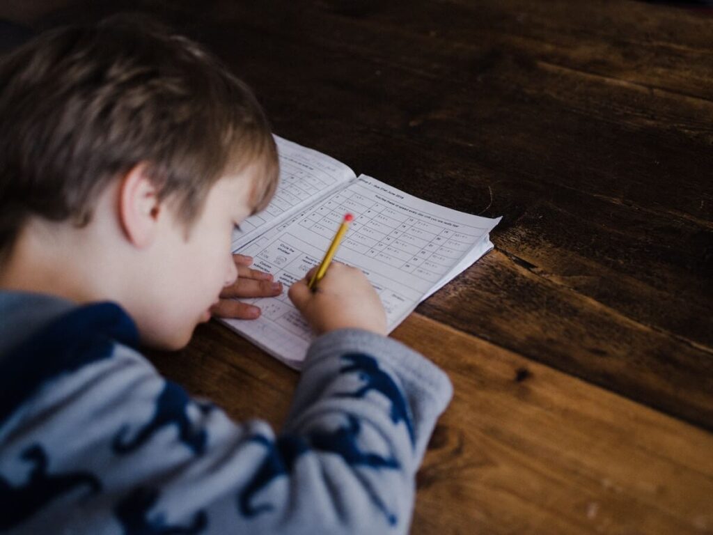 little boy studying