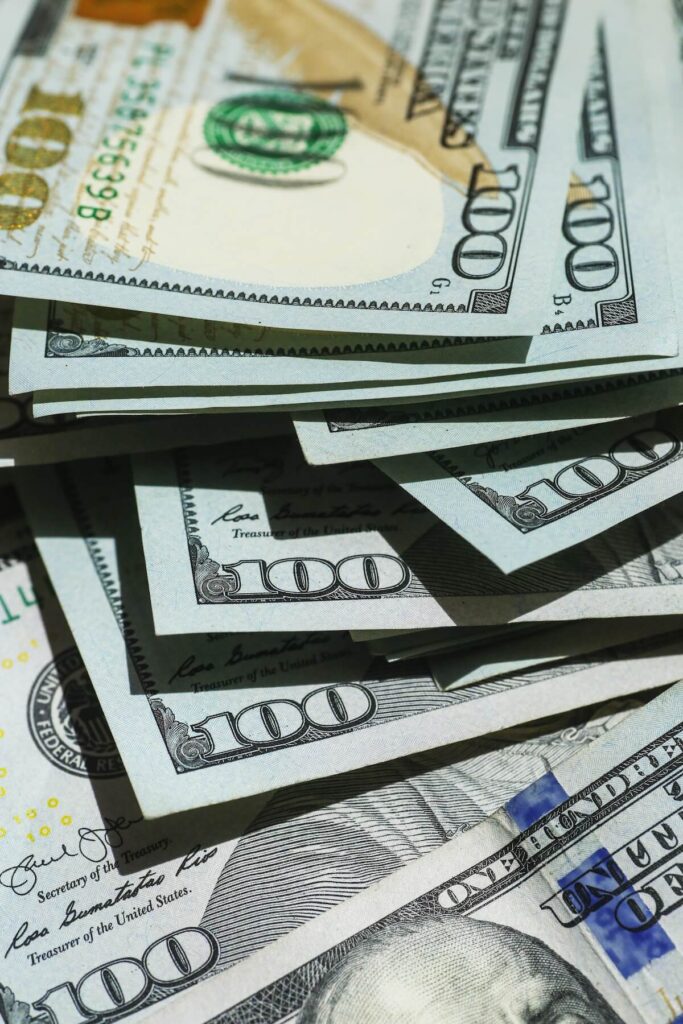 stack of 100 dollar bills