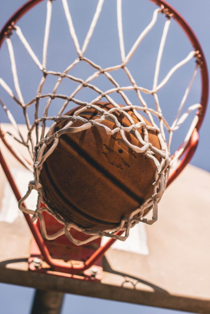 basketball going into basket