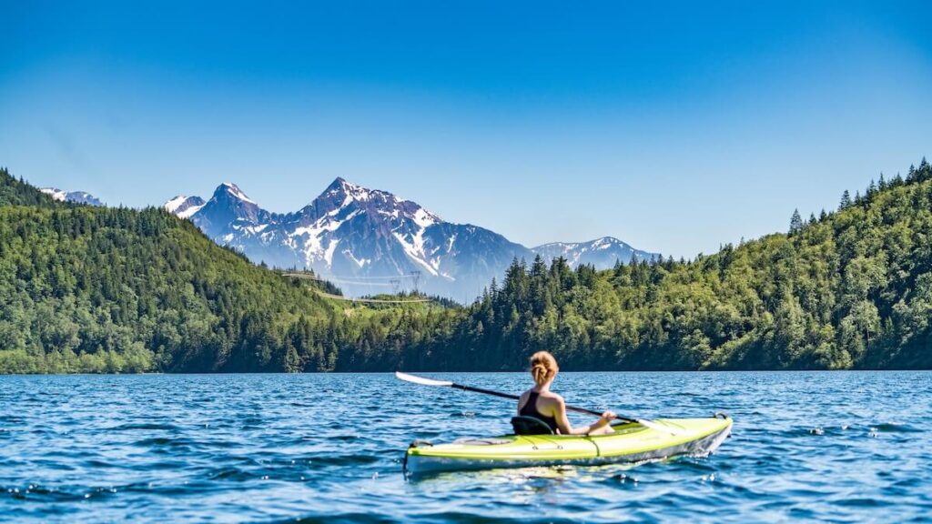 woman canoeing in lake