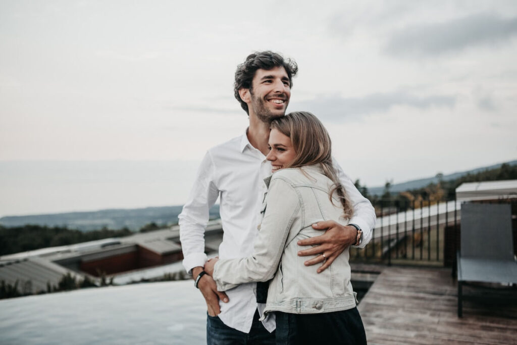 couple hugging on rooftop
