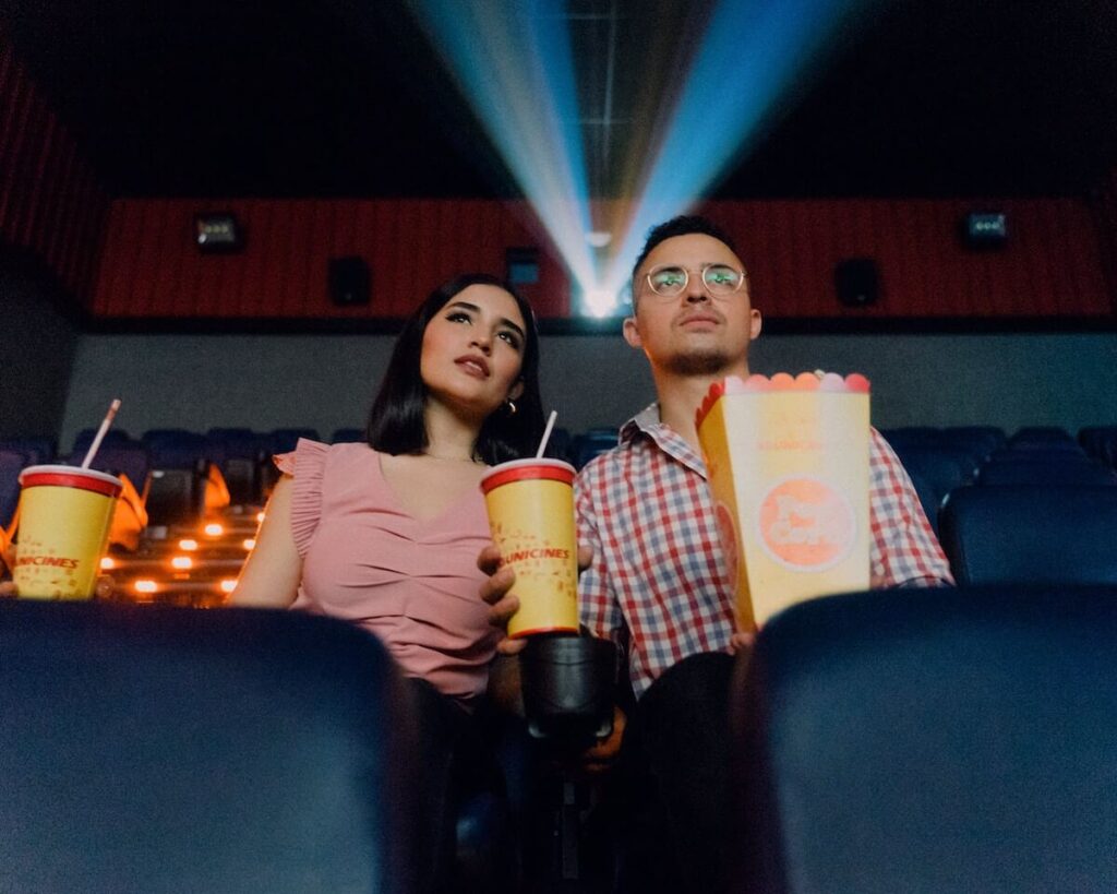 couple watching movie at theater