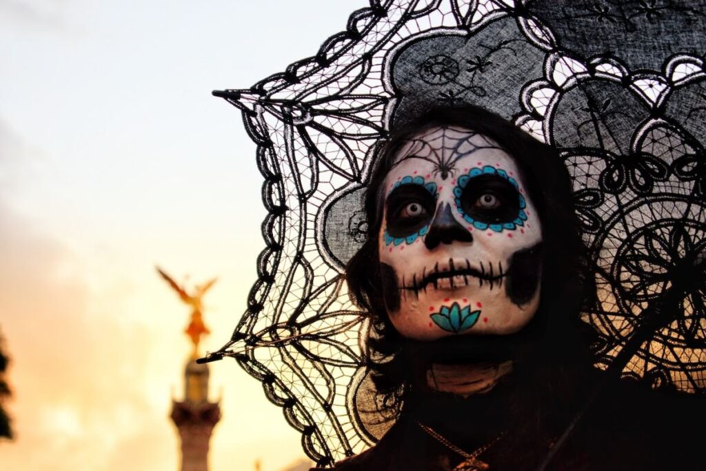 person wearing day of the dead makeup