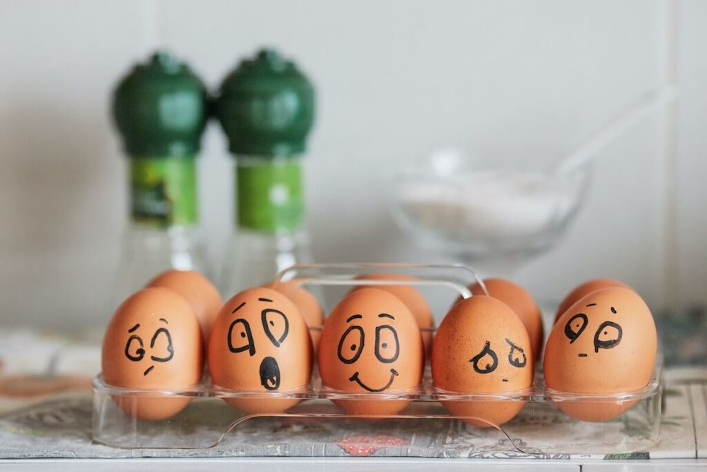 eggs with faces painted on them