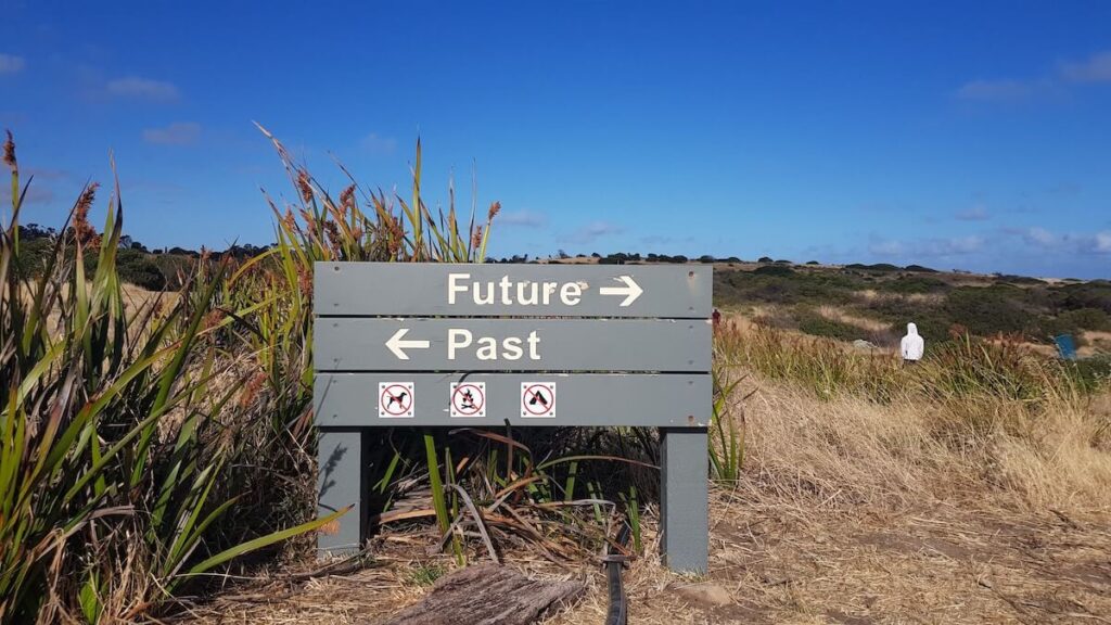 signs pointing to future and past