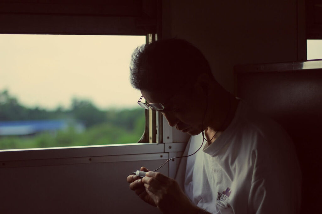 man focusing on phone