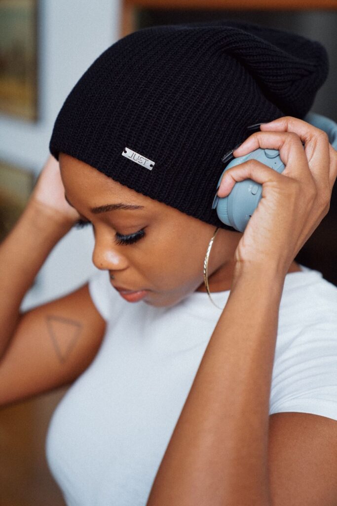 woman posing with headphones on