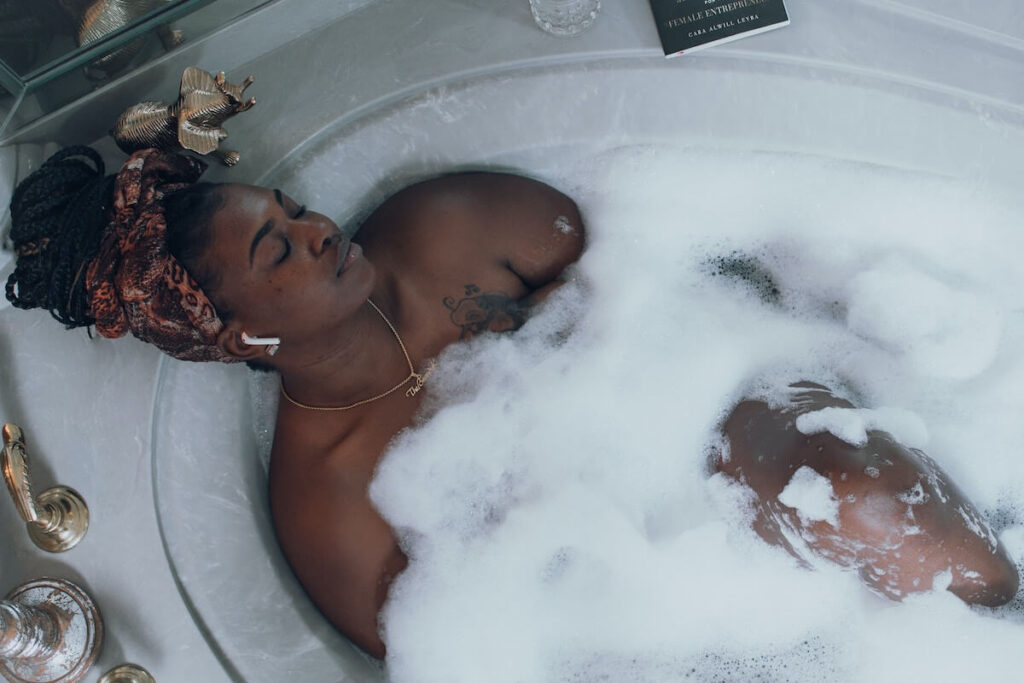woman relaxing in bathtub
