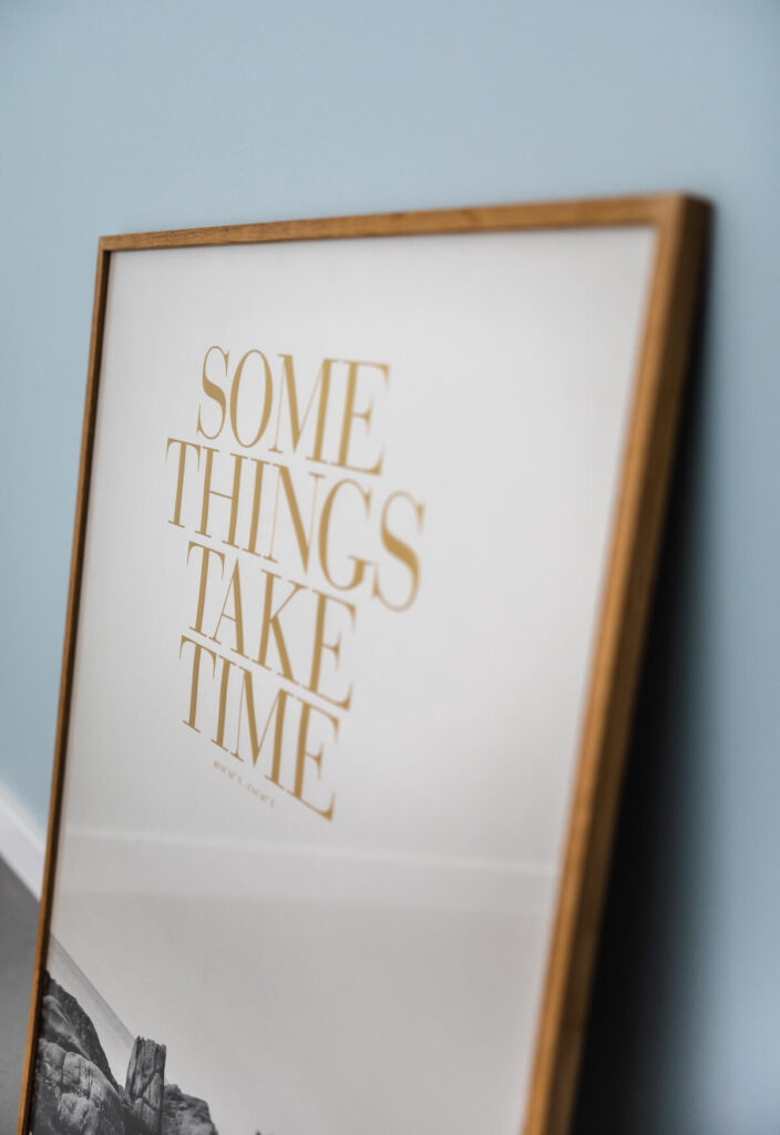 frame photo with text “some things take time”